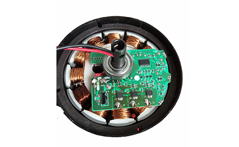 Electronic controller mounted over the copper windings
